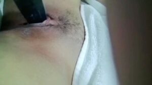 Horny  teen masturbating using hair trimmer